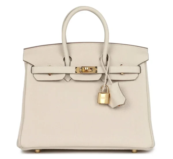 Birkin is in Craie togo leather with gold hardware and has tonal stitching
